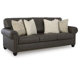 Ashley Roxmere living room set with a sofa, loveseat, and armchair in neutral fabric, featuring plush cushions and modern design.
