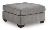 Ashley Marleton living room set featuring a sofa and armchair with neutral upholstery and modern design.