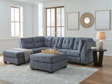 Ashley Furniture Marleton living room set with sofa and armchair, featuring neutral upholstery and modern design.