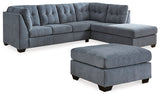 Ashley Furniture Marleton living room set with sofa and armchair in a modern design, featuring neutral fabric upholstery and wooden legs.
