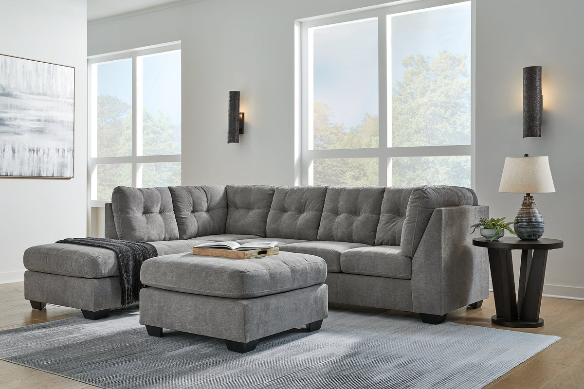 Ashley Furniture Marleton living room set featuring a sofa and loveseat with neutral fabric upholstery and modern design.