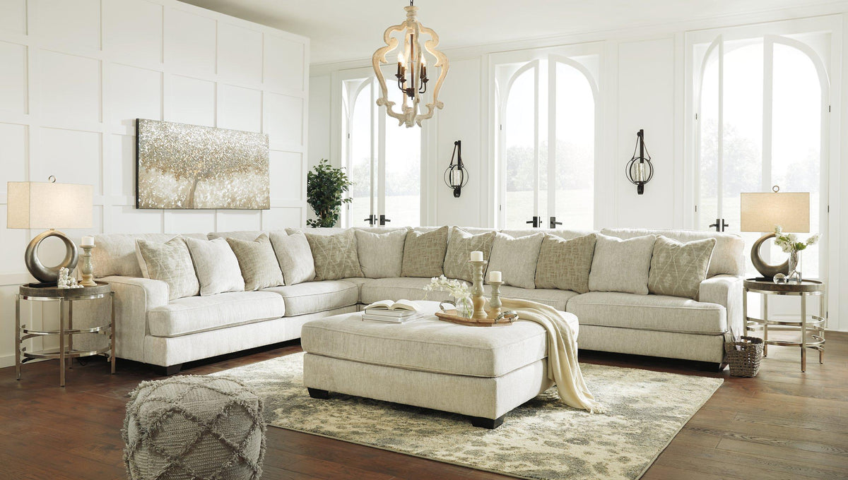 Ashley Furniture Rawcliffe living room set with sofa and armchair, featuring neutral upholstery and modern design.
