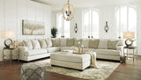 Ashley Furniture Rawcliffe living room set with sofa and armchair, featuring neutral upholstery and modern design.