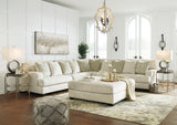 Ashley Furniture Rawcliffe living room set with sofa and armchair, featuring neutral fabric upholstery and modern design.