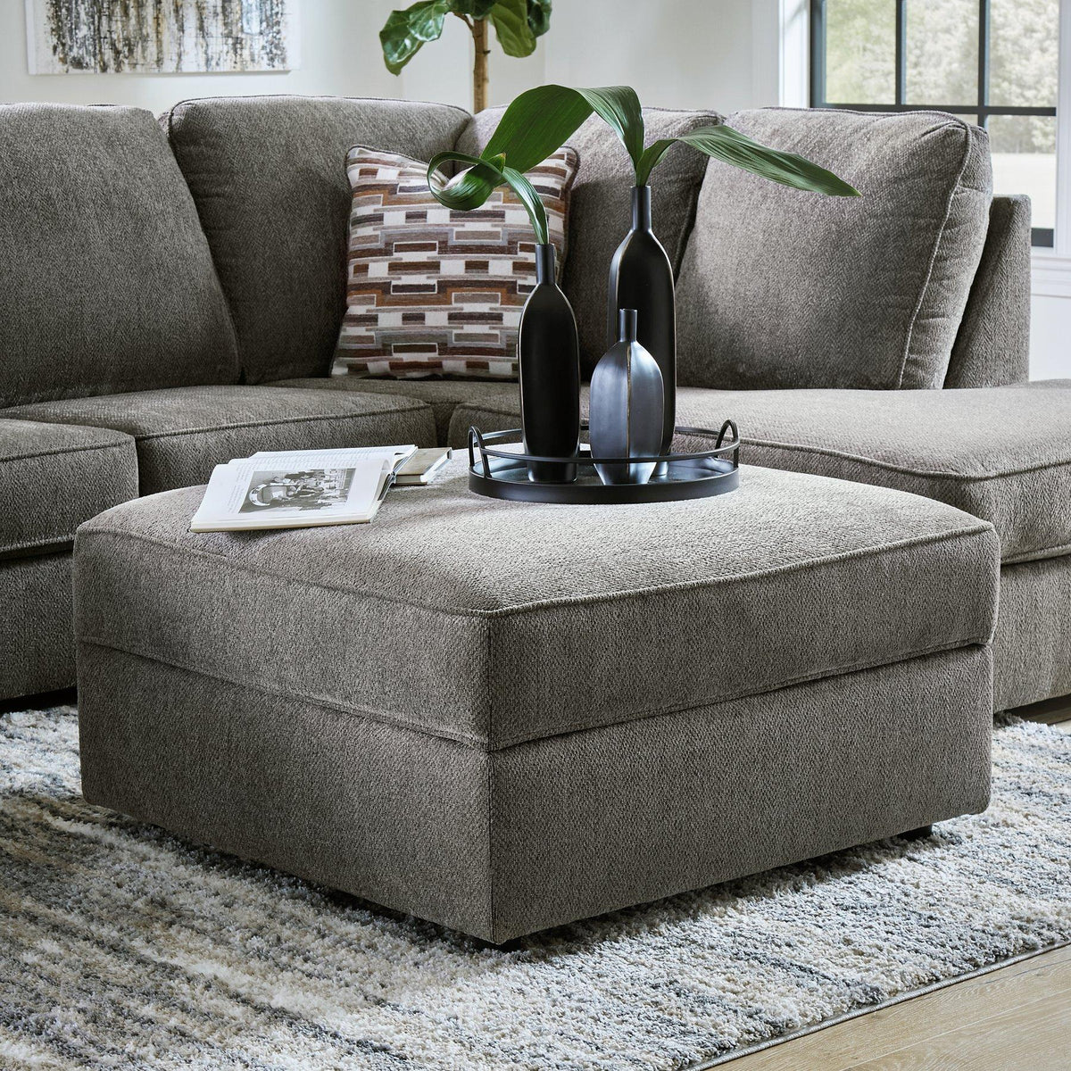 Ashley Furniture O'Phannon living room set with sofa and loveseat featuring neutral upholstery and modern design.