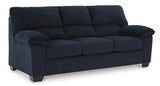 Ashley Furniture SimpleJoy living room set featuring a sofa and armchair with neutral upholstery and modern design.
