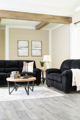 Ashley Furniture SimpleJoy living room set with a sofa and armchair, featuring neutral fabric and modern design.