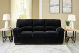 Ashley Furniture SimpleJoy living room set featuring a sofa and armchair with neutral fabric and modern design.
