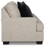 Ashley Furniture Vayda Living Room Set with sofa, loveseat, and coffee table in modern fabric and wood finish.