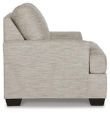 Ashley Vayda living room set featuring a sofa and loveseat with neutral upholstery and modern design in a stylish living space.