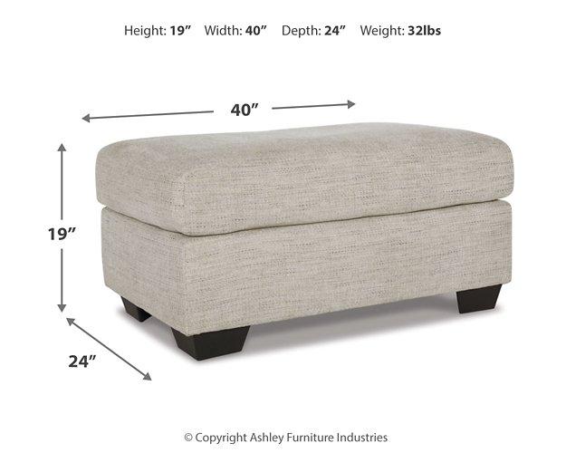 Ashley Furniture Vayda living room set with sofa and armchair, featuring neutral upholstery and modern design.