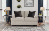Ashley Furniture Vayda living room set with sofa, loveseat, and armchair in a modern fabric upholstery arrangement.