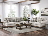 Ashley Furniture Clearbrooke living room set with sofa and matching armchair in a modern design, shown in a stylish living space.