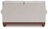 Ashley Furniture Clearbrooke living room set with plush sofas and armchairs arranged in a modern, stylish living space.