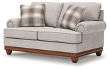 Ashley Furniture Clearbrooke living room set featuring a sofa and loveseat with neutral fabric and modern design.