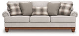 Ashley Furniture Clearbrooke living room set with sofa and armchair, featuring neutral upholstery and modern design.