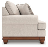 Ashley Furniture Clearbrooke living room set with sofa and armchair, featuring neutral upholstery and modern design.