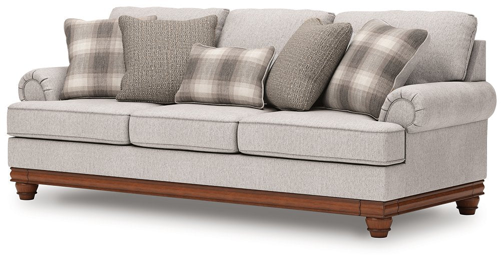 Ashley Furniture Clearbrooke living room set featuring a sofa and armchair with neutral upholstery and modern design.