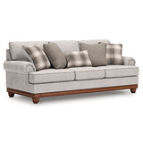 Ashley Furniture Clearbrooke living room set with a sectional sofa, featuring neutral upholstery and plush cushions in an angled view.