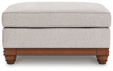 Ashley Furniture Clearbrooke living room set with sofa and armchairs, featuring neutral upholstery and modern design.
