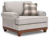 Ashley Furniture Clearbrooke living room set with sofa and armchair, featuring neutral upholstery and modern design.