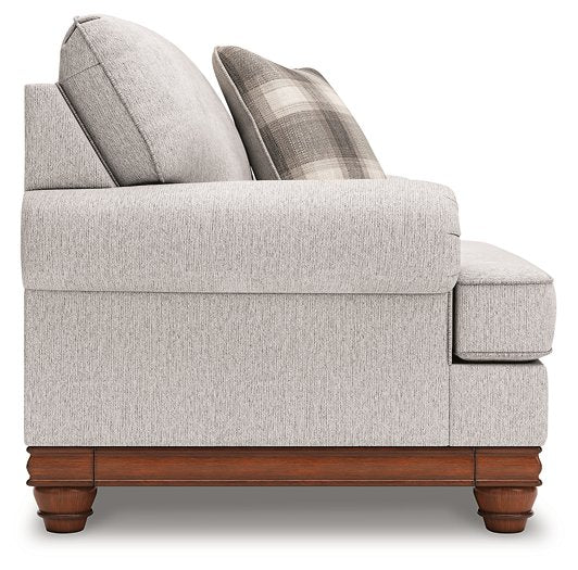 Ashley Furniture Clearbrooke living room set with sofa and armchair in a modern design, featuring neutral fabric upholstery.