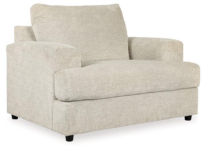Ashley Furniture Soletren Living Room Set featuring a plush sofa and matching armchair in a modern design with neutral upholstery.