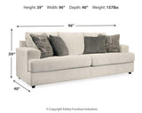 Ashley Furniture Soletren living room set featuring a sofa and armchair with plush cushions and modern design.