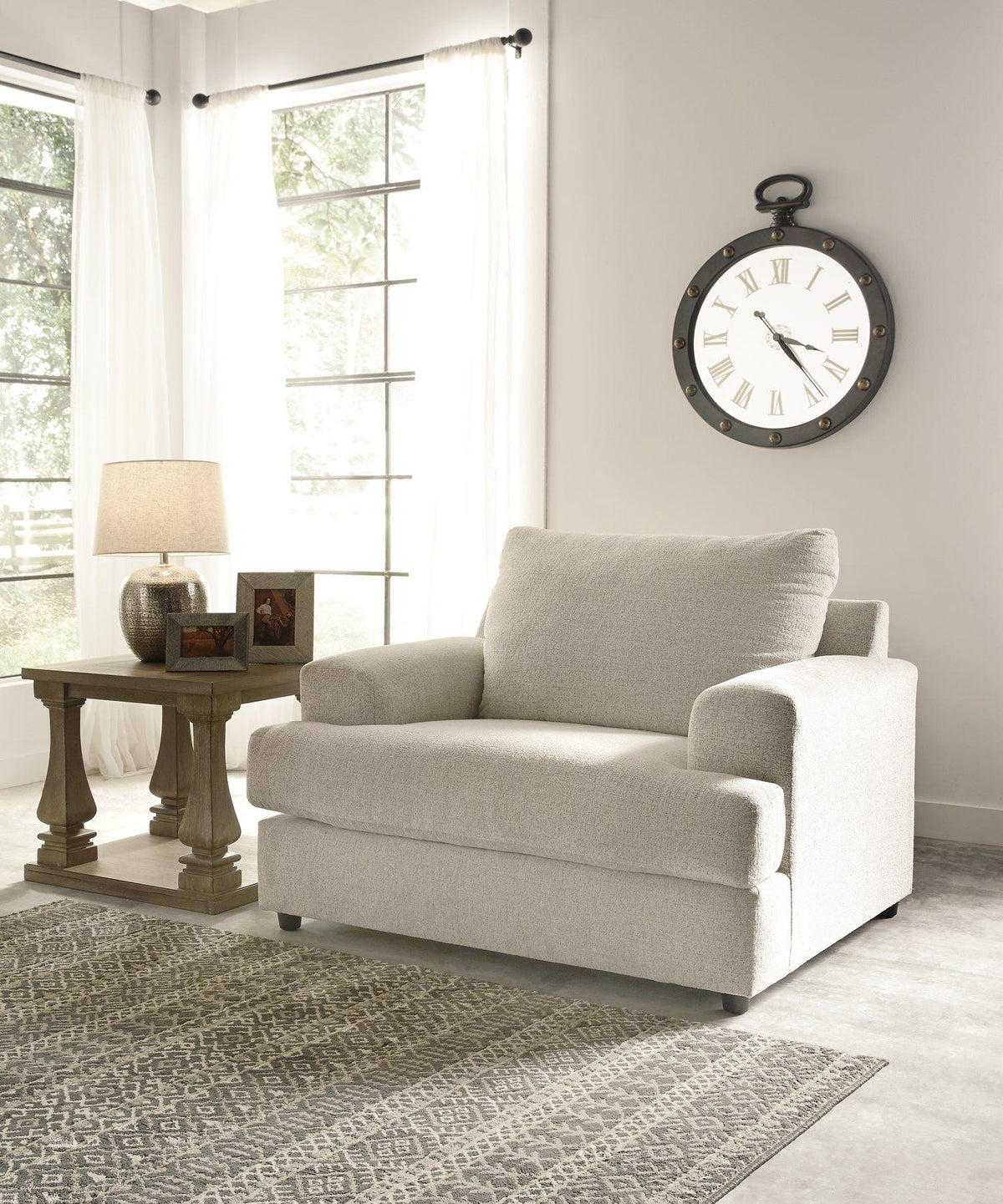 Ashley Furniture Soletren living room set with sofa and armchairs in a modern design, shown in a stylish living room setting.