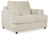 Ashley Furniture Soletren Living Room Set featuring a sofa and armchairs with neutral upholstery and wooden accents.