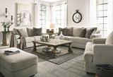 Ashley Furniture Soletren Living Room Set with sofa and armchair, featuring neutral upholstery and modern design.
