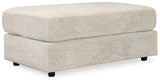 Ashley Furniture Soletren Living Room Set featuring a sofa and armchair with neutral upholstery and modern design.