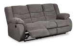 Ashley Furniture Tulen living room set featuring a sofa, armchair, and coffee table in a modern, stylish design.