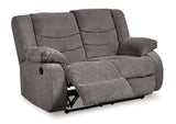 Ashley Furniture Tulen living room set with sofa, loveseat, and armchair in a modern design, displayed in a stylish living space.