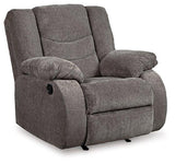 Ashley Furniture Tulen Living Room Set featuring a sofa and matching armchair with neutral upholstery and modern design.