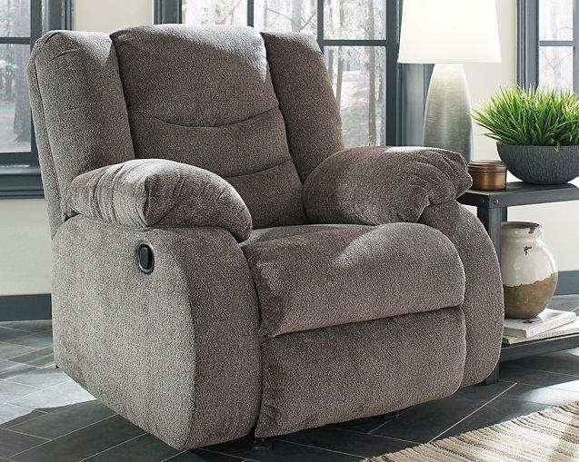 Ashley Furniture Tulen living room set with sofa and armchairs in a modern design, featuring neutral upholstery and wood accents.