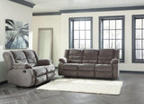 Ashley Furniture Tulen living room set with sofa and armchairs in a modern design, shown in a stylish, well-lit home interior.