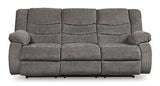 Ashley Furniture Tulen living room set with sofa and loveseat, featuring plush cushions and modern design in neutral tones.