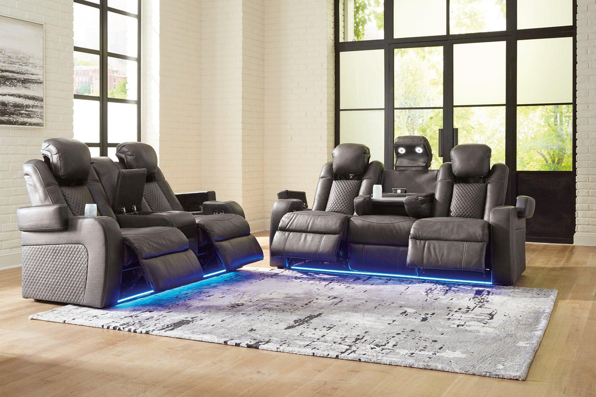 Comfortable Fyne-Dyme Ashley Furniture living room set with sofa and armchair in a modern living space.