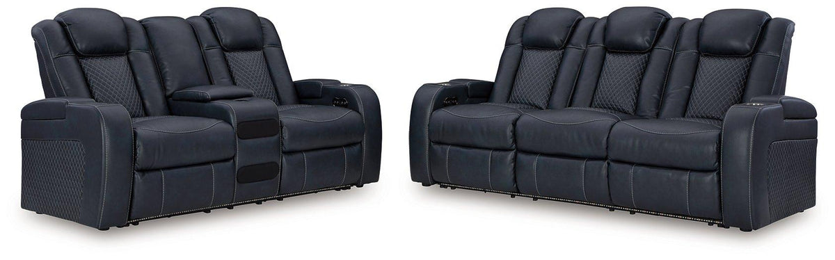 Ashley Furniture Fyne-Dyme living room set featuring a sofa and armchair with plush cushions and coordinating fabric.