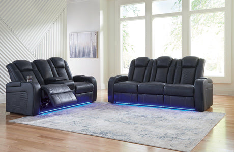 Ashley Furniture Fyne-Dyme living room set with sofa and armchair in a modern design, shown in a cozy living space.
