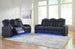 Ashley Furniture Fyne-Dyme living room set with sofa and armchair in a modern design, shown in a cozy living space.