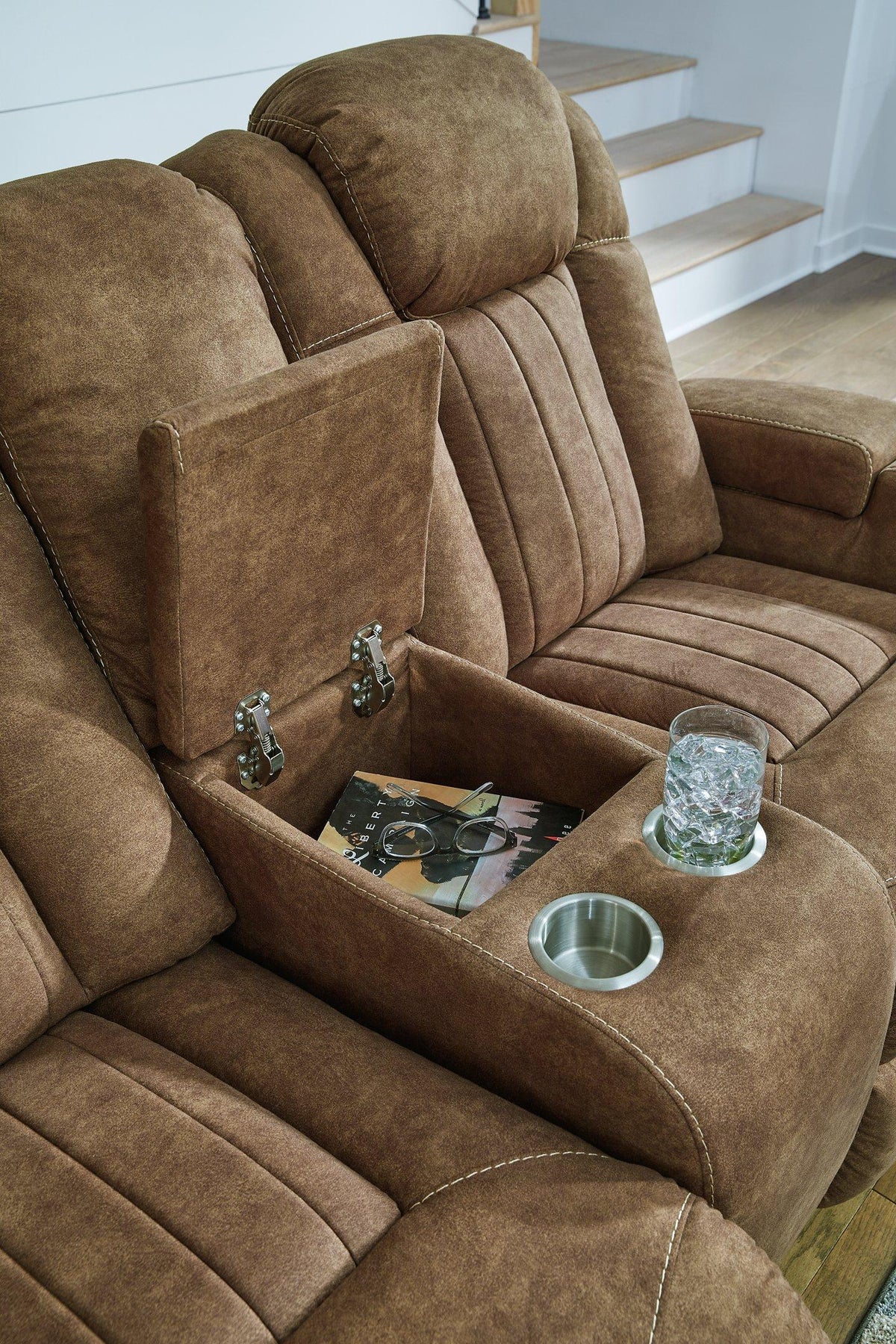 Ashley Furniture Wolfridge living room set with sofa and armchair featuring neutral upholstery and wooden accents.