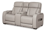 Ashley Furniture Boyington power reclining loveseat with console, showing plush fabric and dual reclining seats from a side angle.