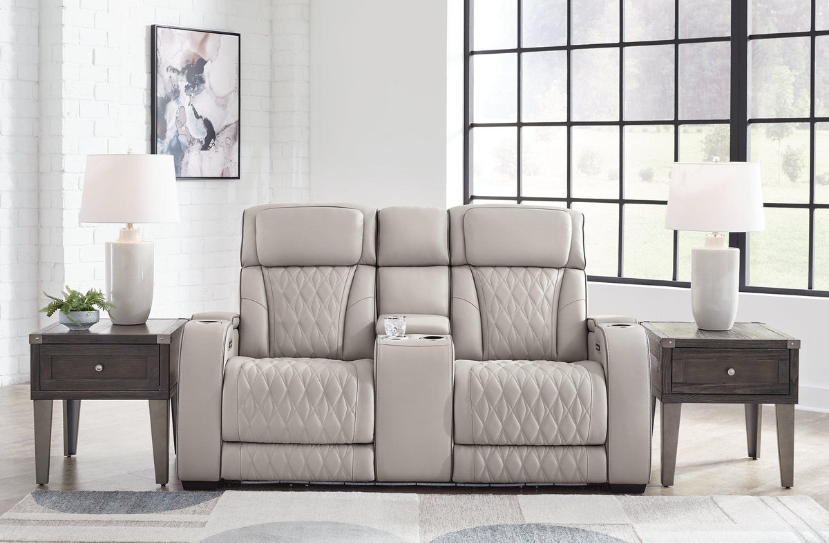 Boyington Power Reclining Loveseat with Console by Ashley Furniture, showing plush fabric, built-in console, and reclining features.
