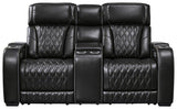 Ashley Furniture Boyington power reclining loveseat with console, featuring plush upholstery and built-in cup holders for comfort.