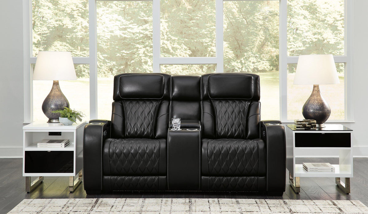 Boyington Power Reclining Loveseat with Console by Ashley Furniture, featuring plush upholstery and built-in cup holders.