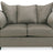 Ashley Furniture Darcy Loveseat with plush fabric and cushioned armrests, perfect for a cozy living room setting.
