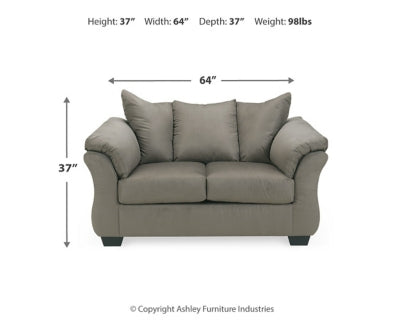Ashley Furniture Darcy Loveseat with plush beige upholstery and rolled arms, perfect for cozy living room seating.