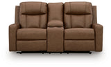 Ashley Furniture Mackmenville reclining loveseat with console, featuring plush fabric, padded armrests, and built-in cup holders.